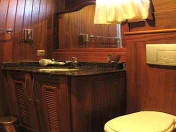 a kitchen with a sink and a toilet aboard KAPTAN YILMAZ Yacht for Charter