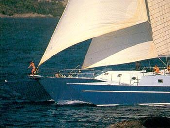 a person sailing on a sailboat aboard CUAN LAW Yacht for Charter