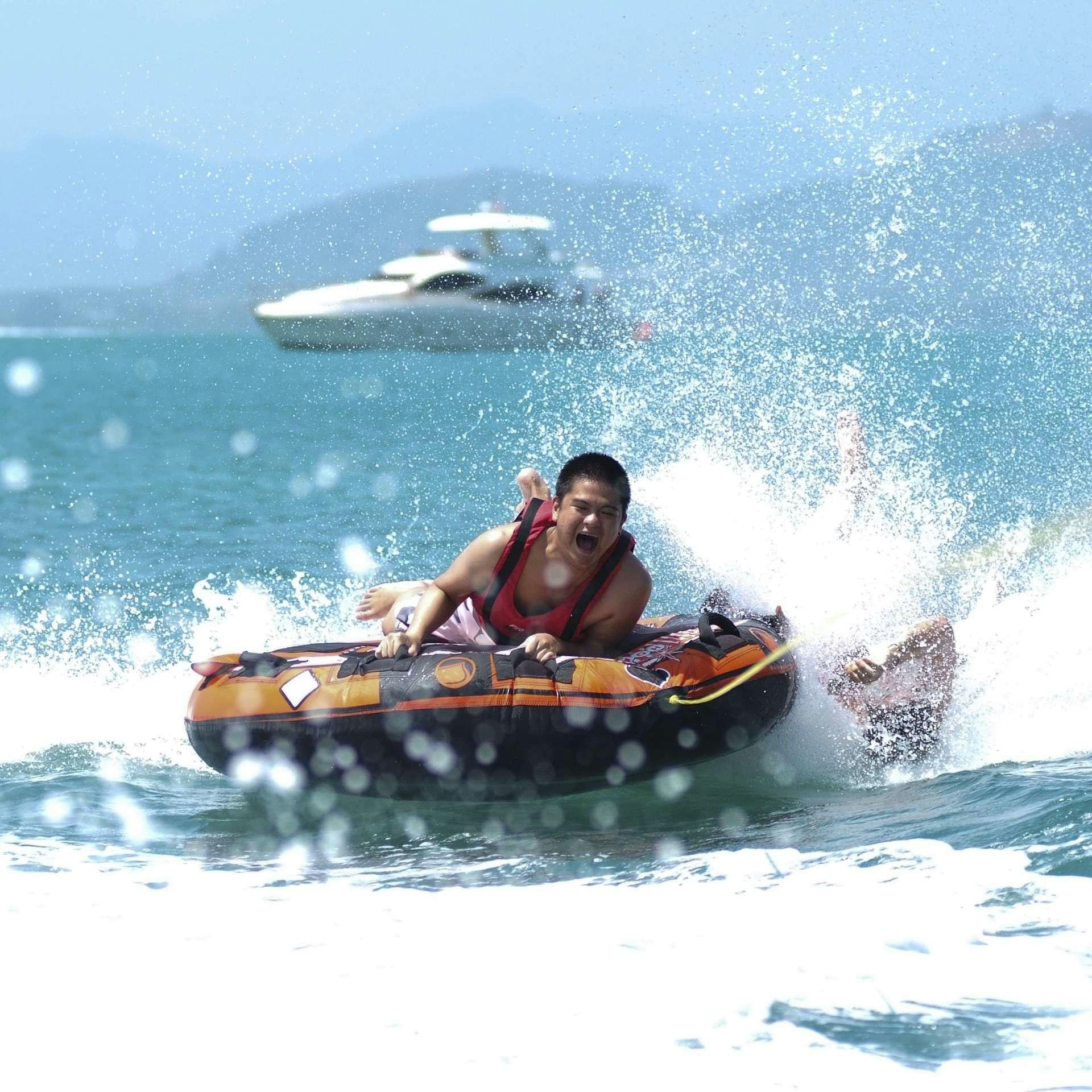 a person riding a jet ski aboard LADY KATHRYN Yacht for Charter