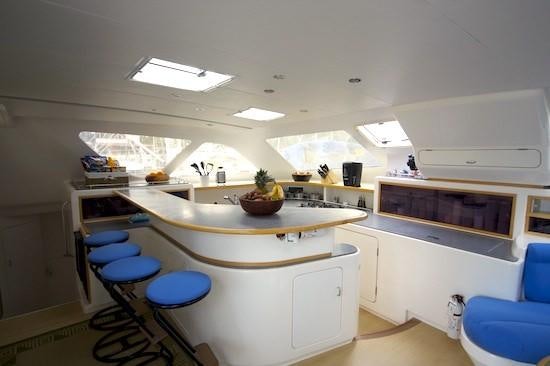 a kitchen with a large island aboard PELICAN Yacht for Charter