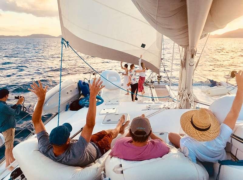 a group of people on a boat aboard PELICAN Yacht for Charter