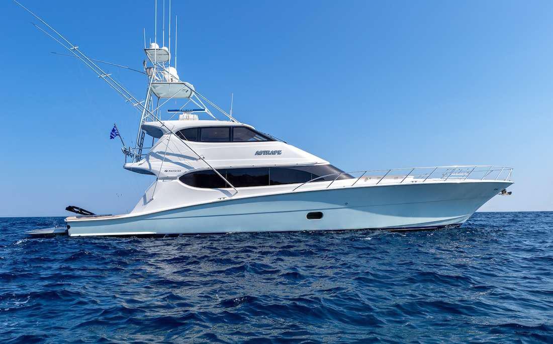 a white yacht in the water aboard ASTRAPE Yacht for Charter