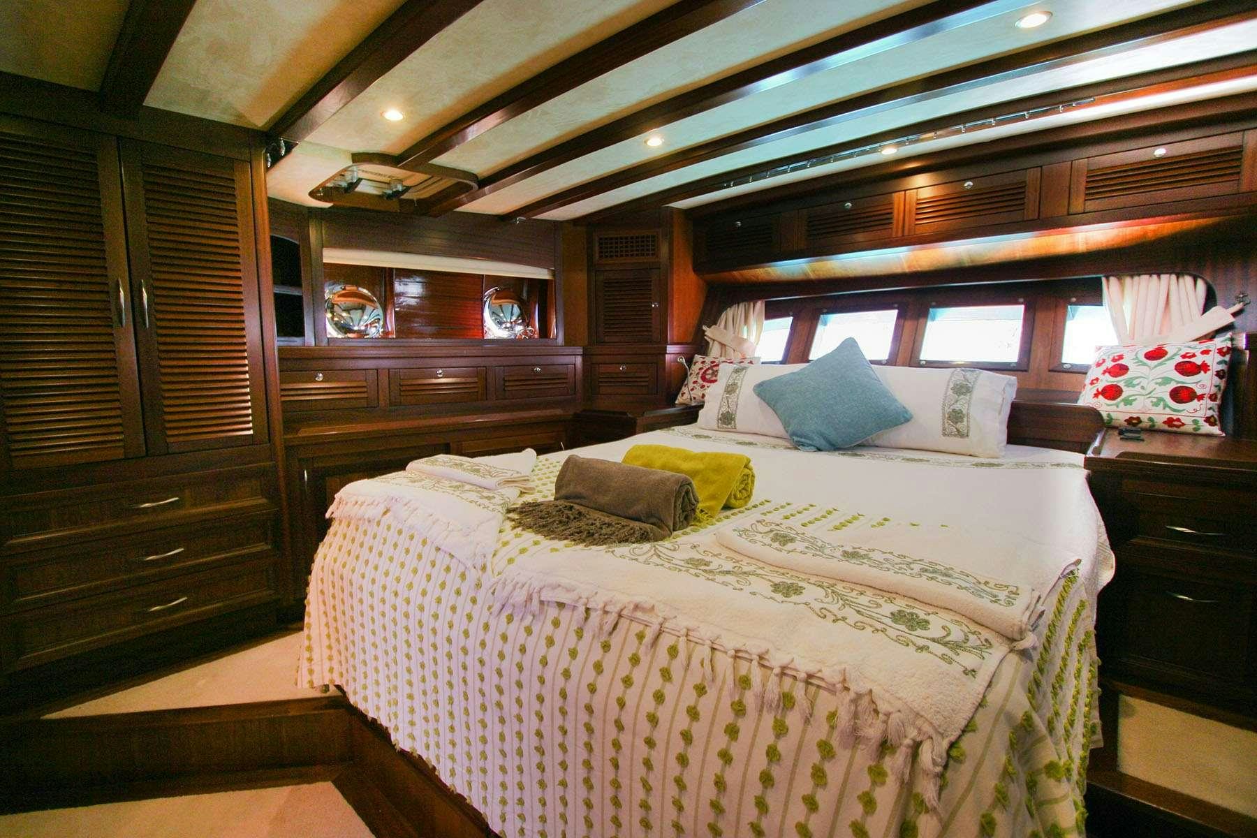 a bed in a cabin aboard LADY FREYA Yacht for Charter