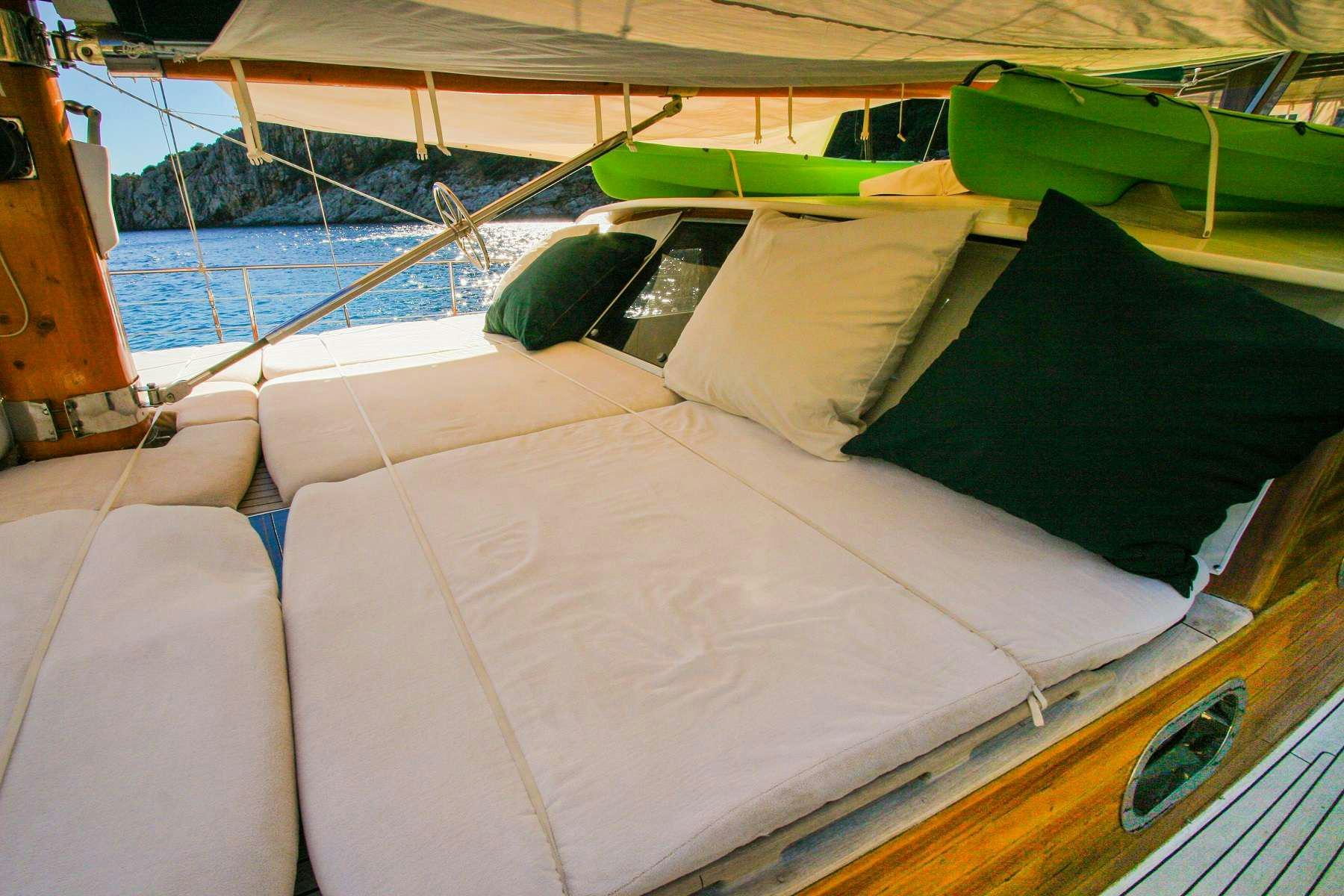 a boat with pillows aboard LADY FREYA Yacht for Charter