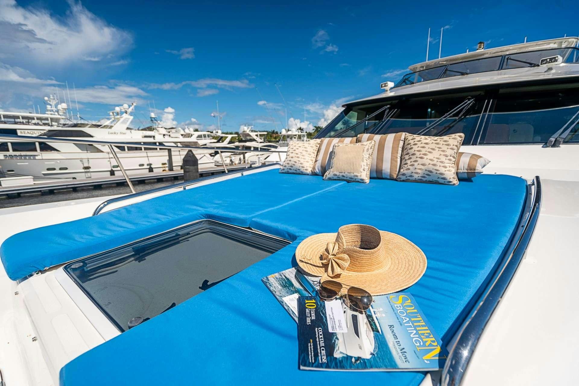 a boat with a hat on it aboard TRUE NORTH Yacht for Charter