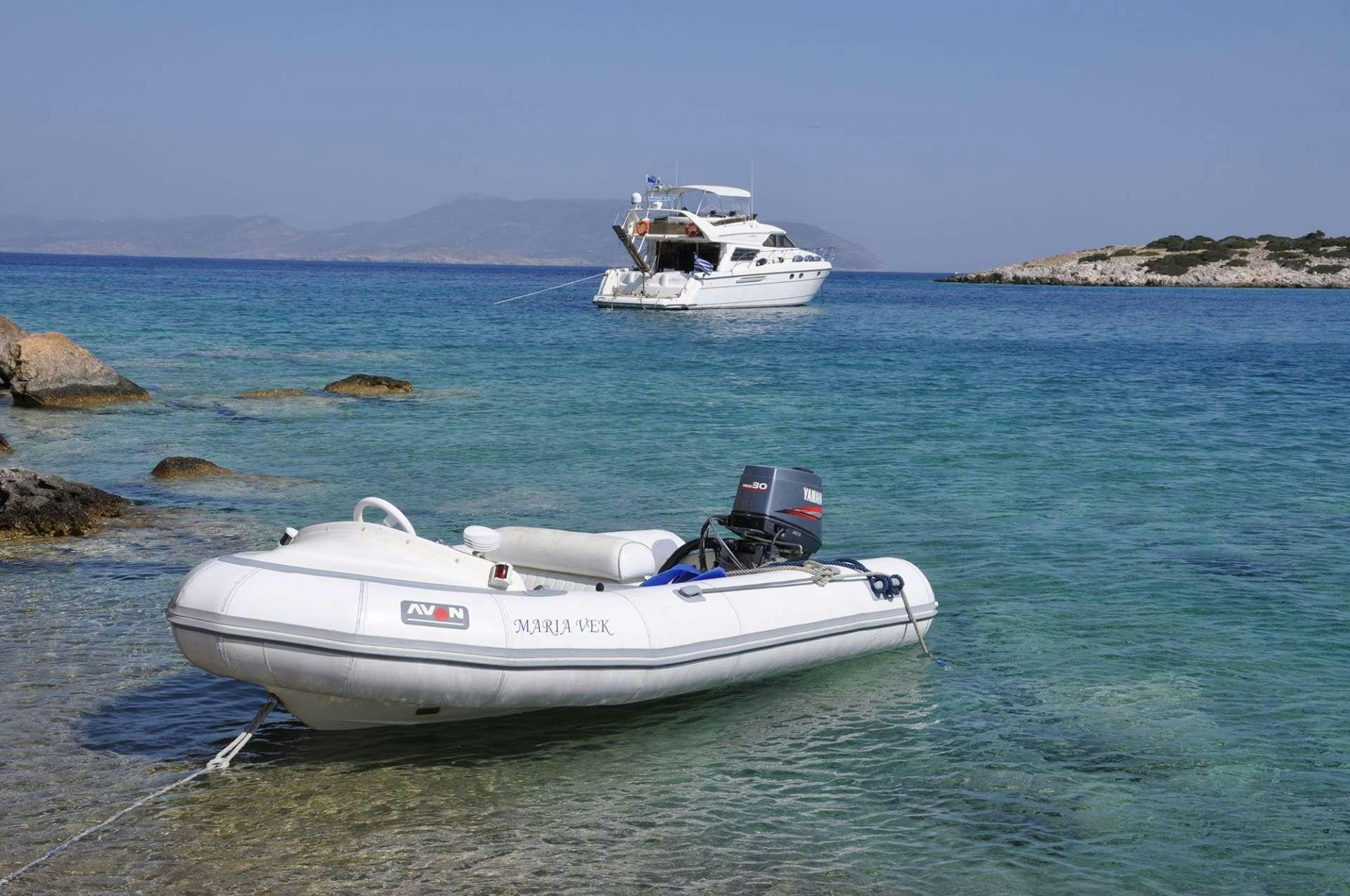 a couple of boats in the water aboard MARIA VEK Yacht for Charter