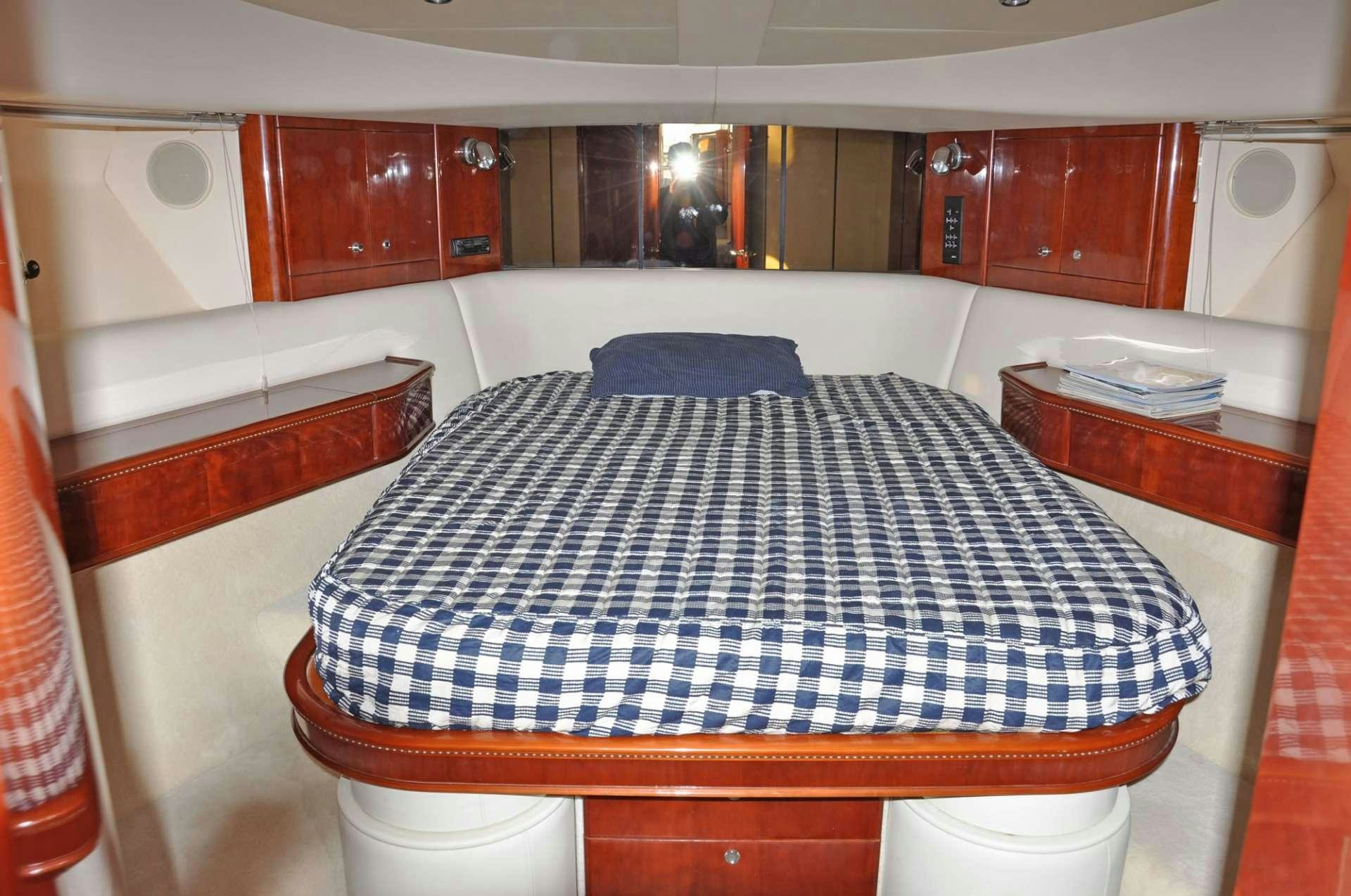 a bed in a room aboard MARIA VEK Yacht for Charter