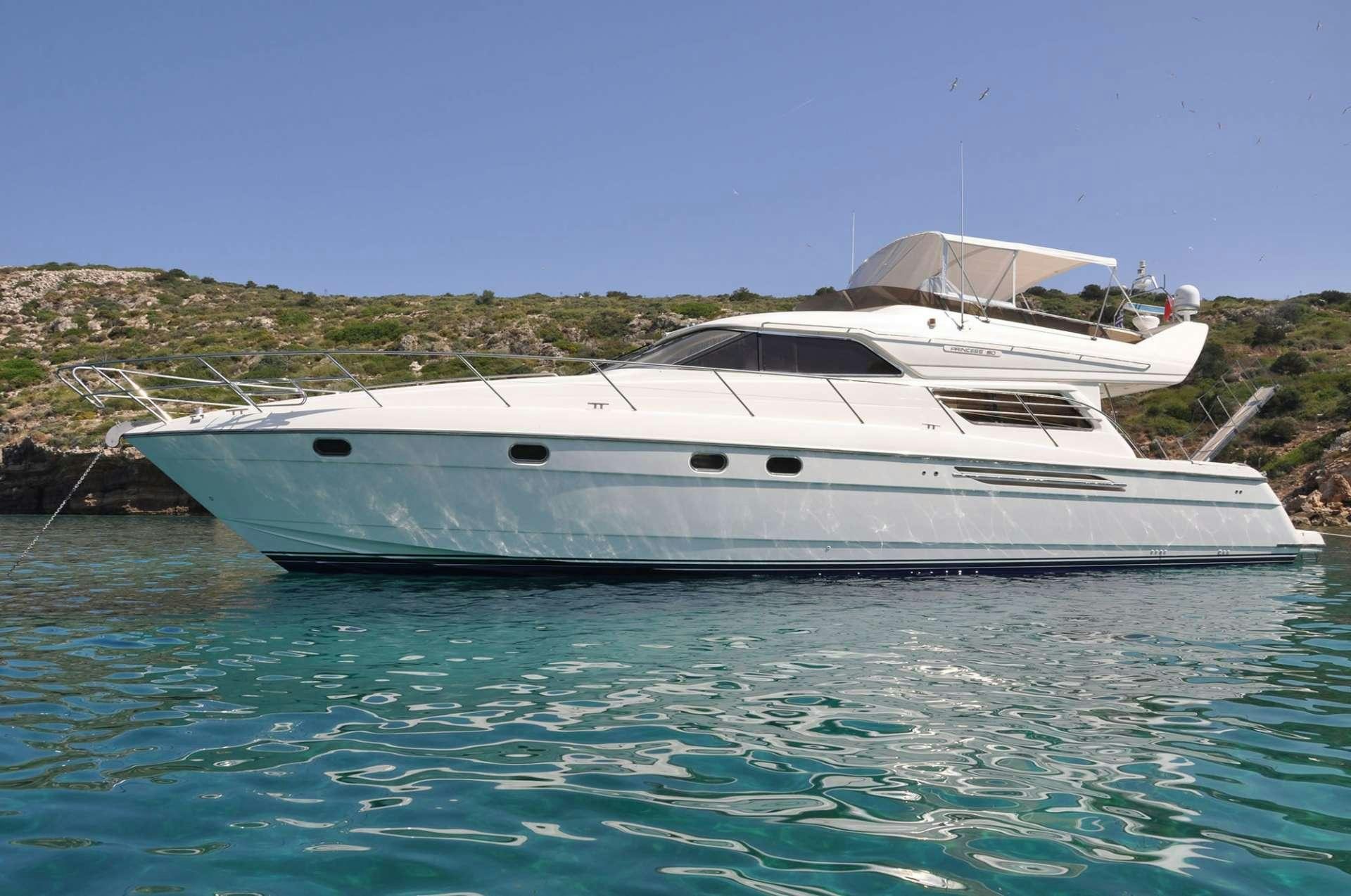 a white boat in the water aboard MARIA VEK Yacht for Charter