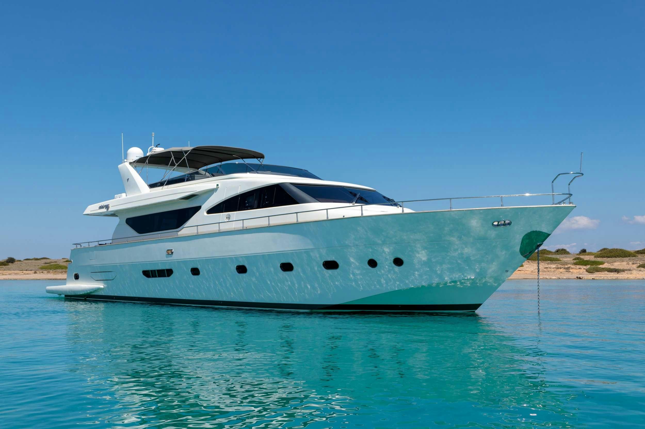 a white yacht in the water aboard FREEDOM Yacht for Charter