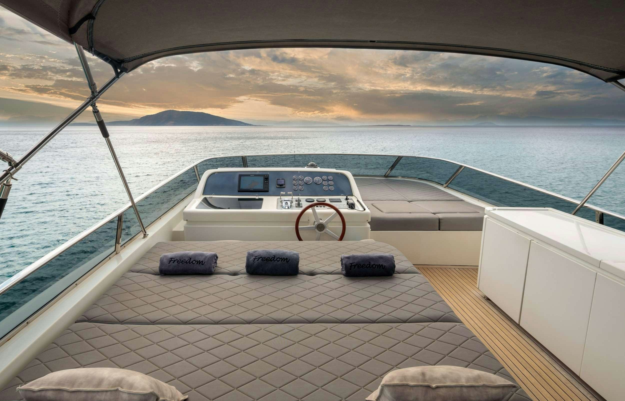 a boat on the water aboard FREEDOM Yacht for Charter