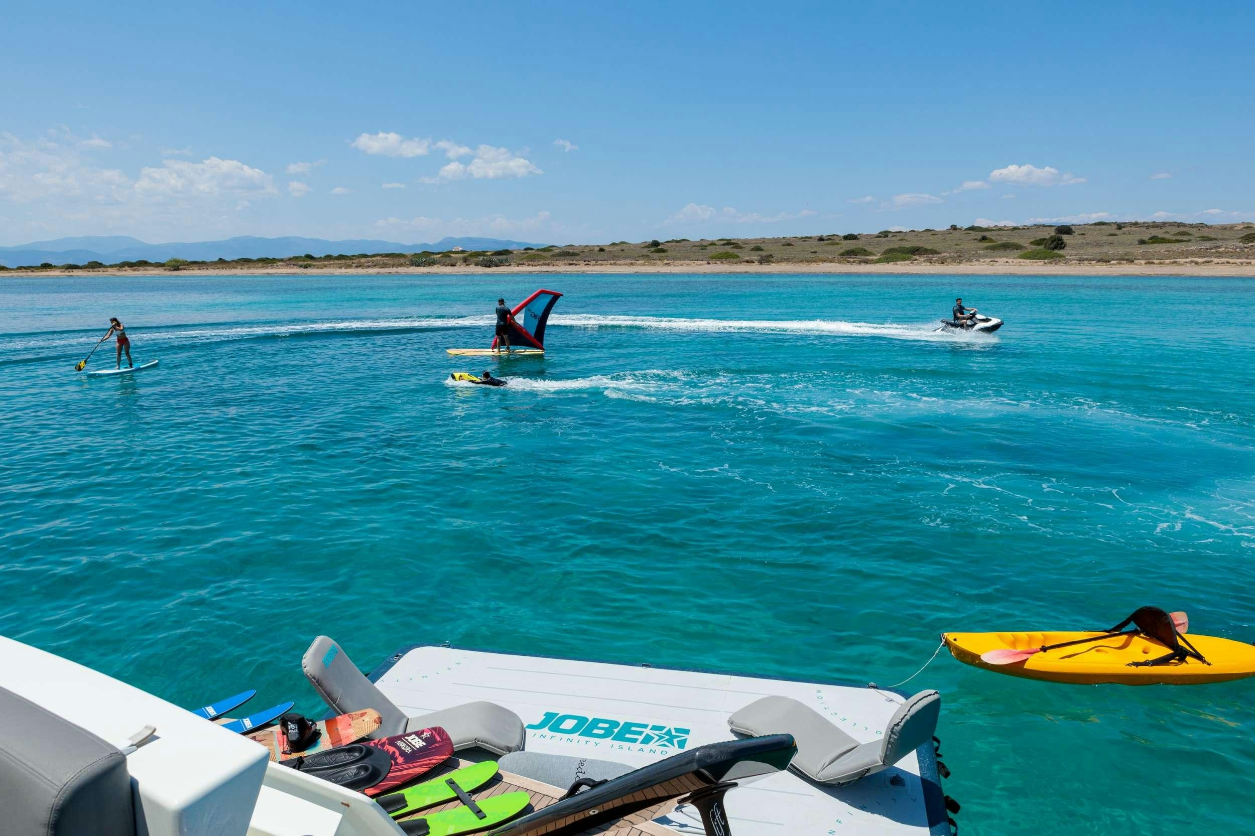 people are enjoying the water aboard FREEDOM Yacht for Charter
