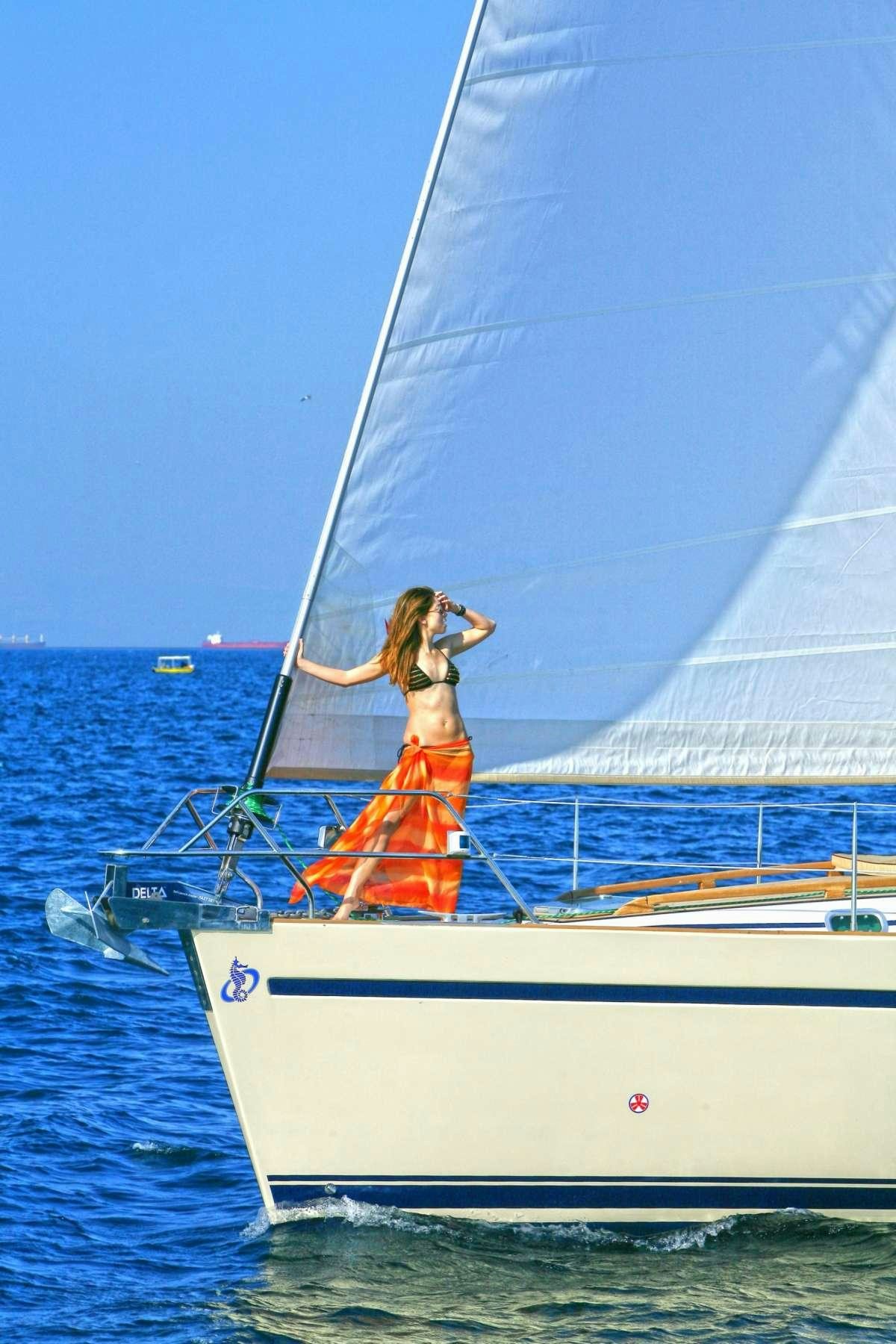a person on a sailboat aboard MYTHOS Yacht for Charter