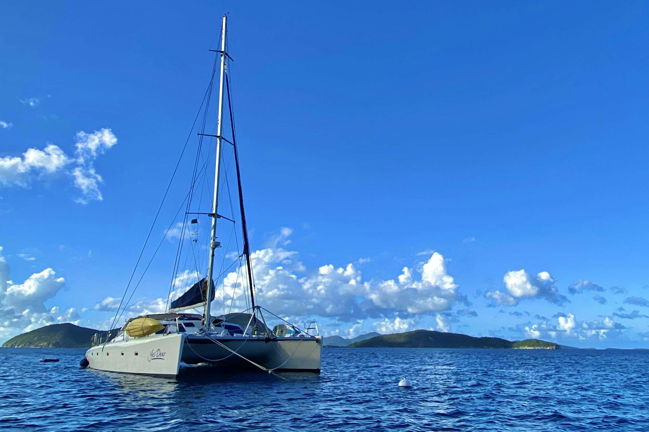 a sailboat on the water aboard YES DEAR Yacht for Charter