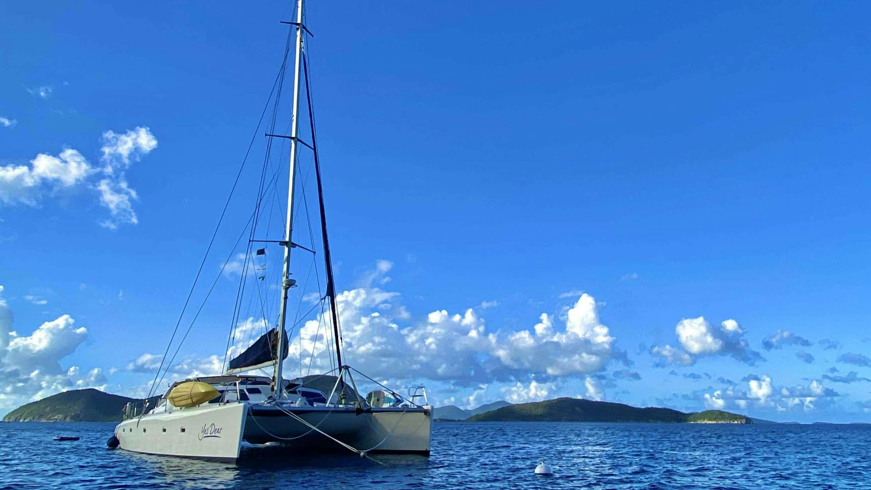 a sailboat on the water aboard YES DEAR Yacht for Charter