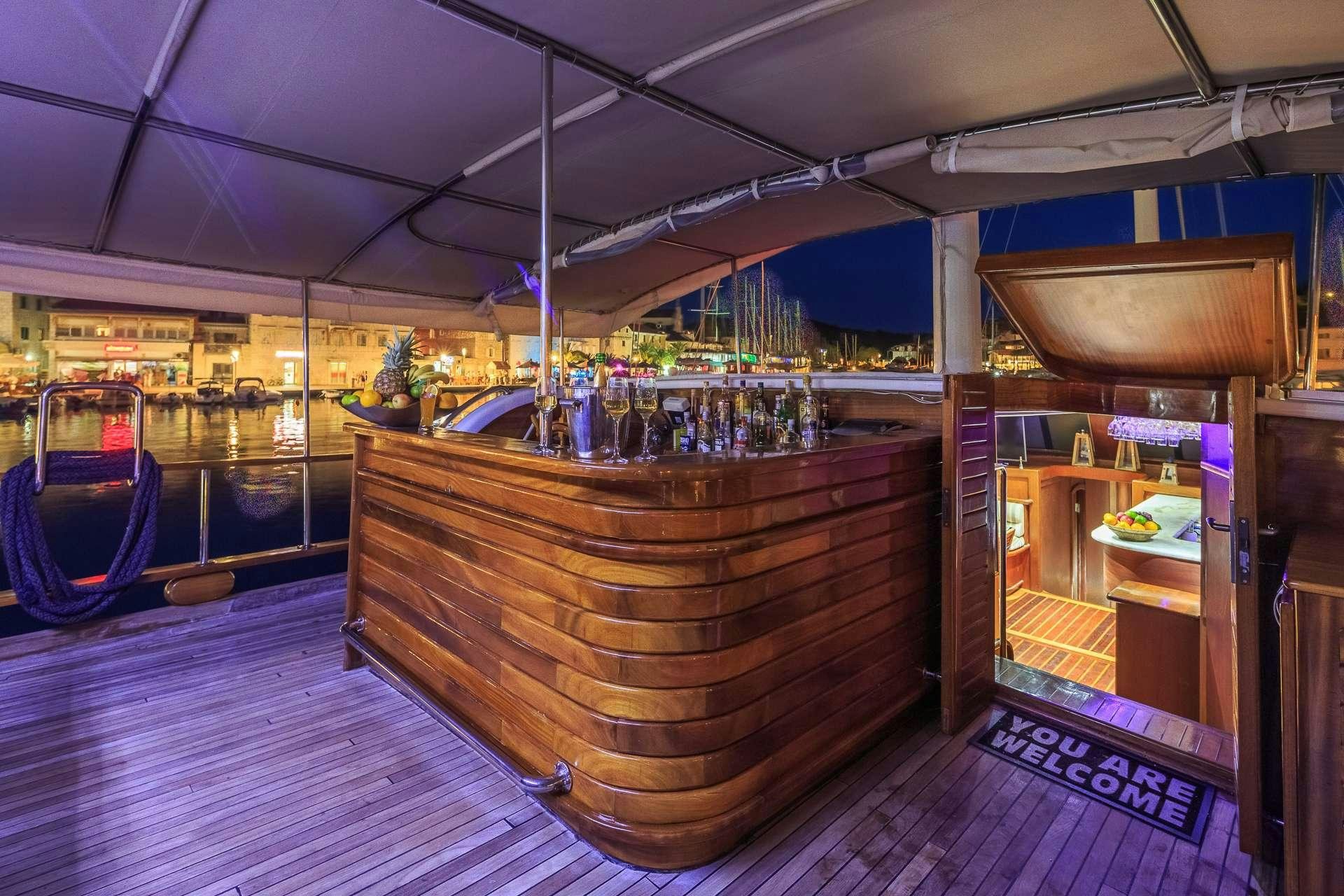 a boat on a dock aboard ALLUREE Yacht for Charter