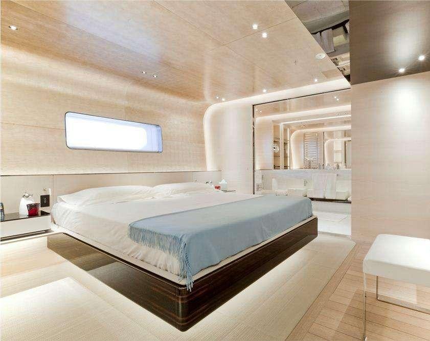 a large bedroom with a large bed aboard ASLEC 4 Yacht for Charter