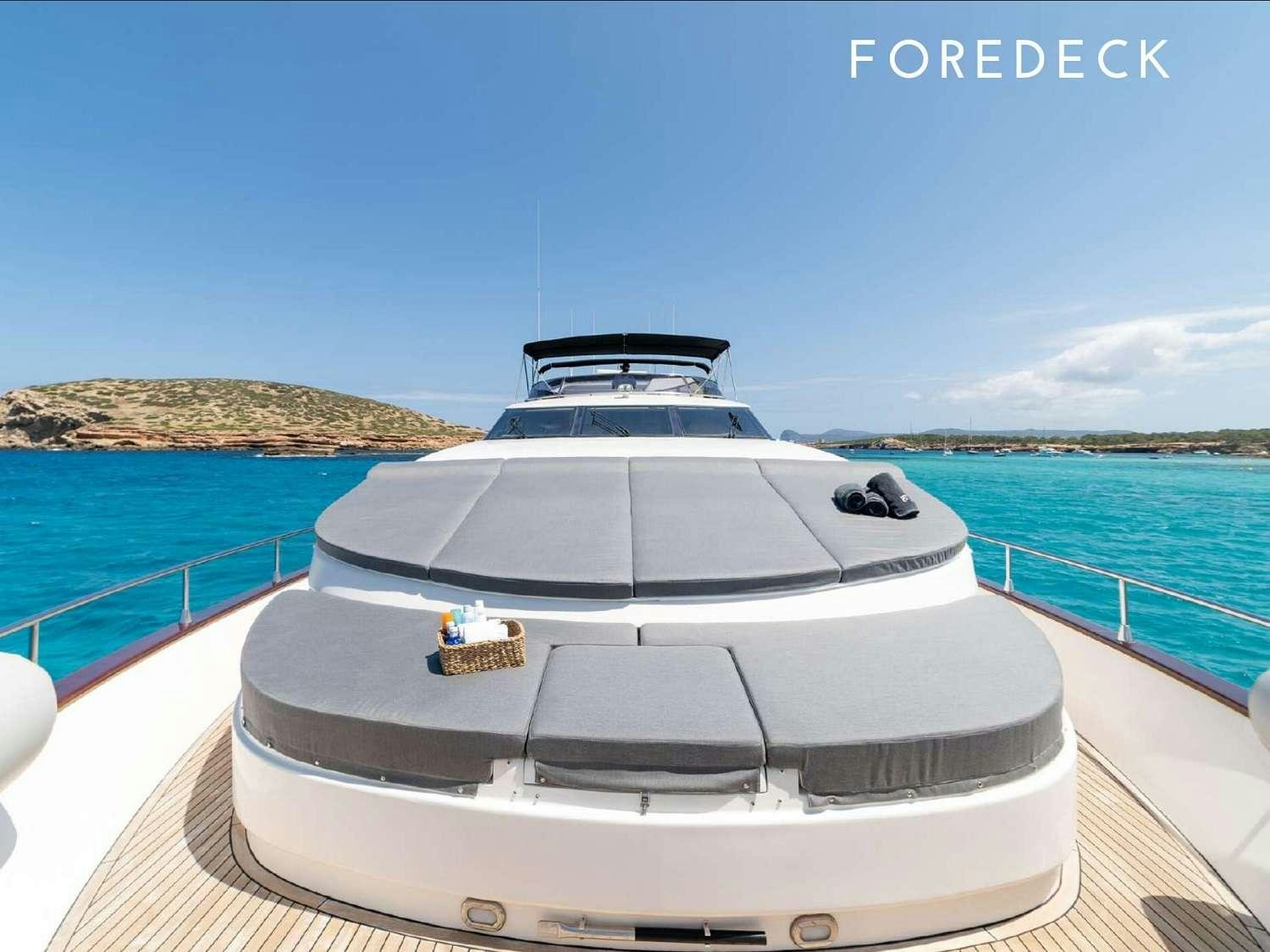 a white boat on a dock aboard B3 Yacht for Charter