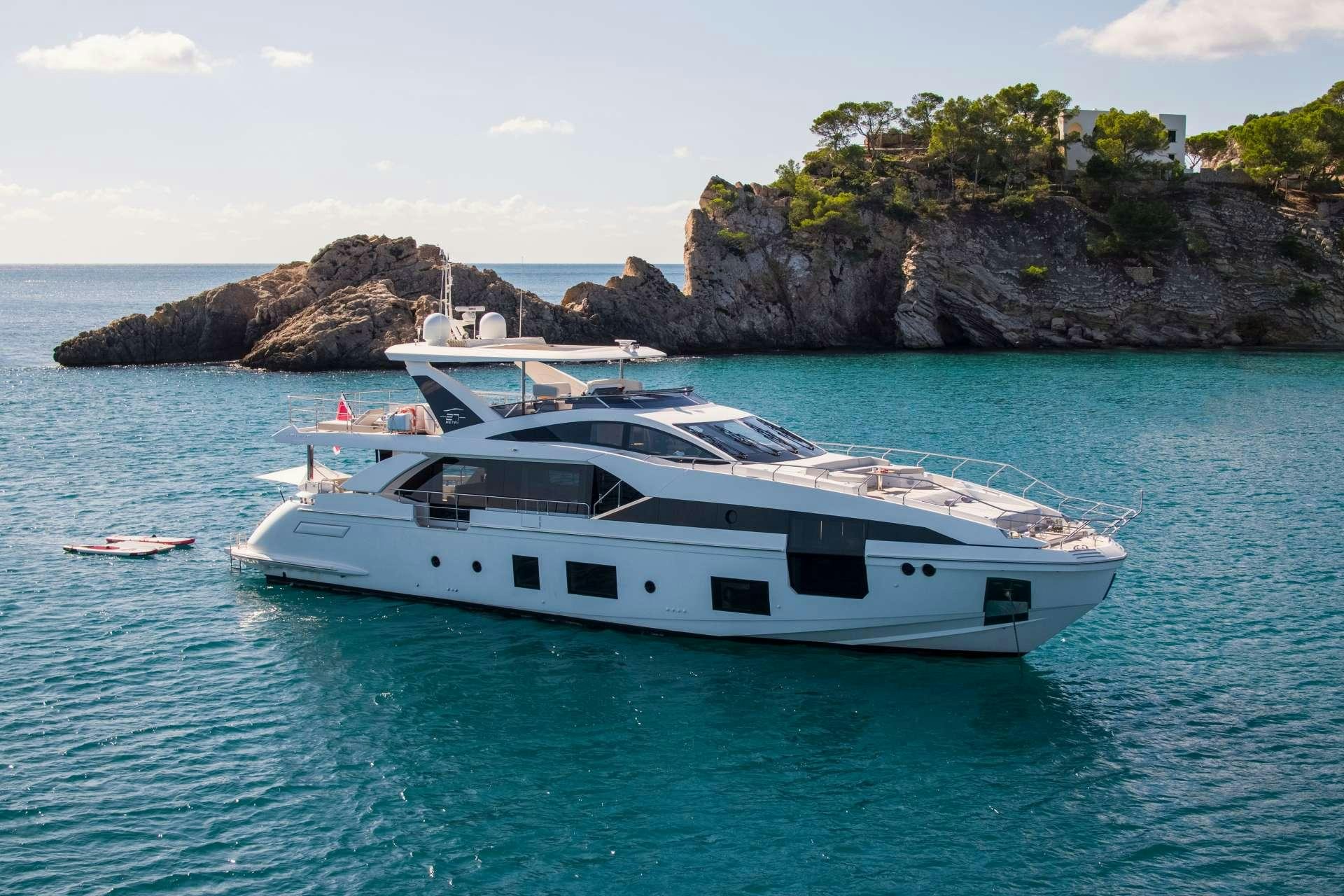a boat in the water aboard AKAMA Yacht for Charter