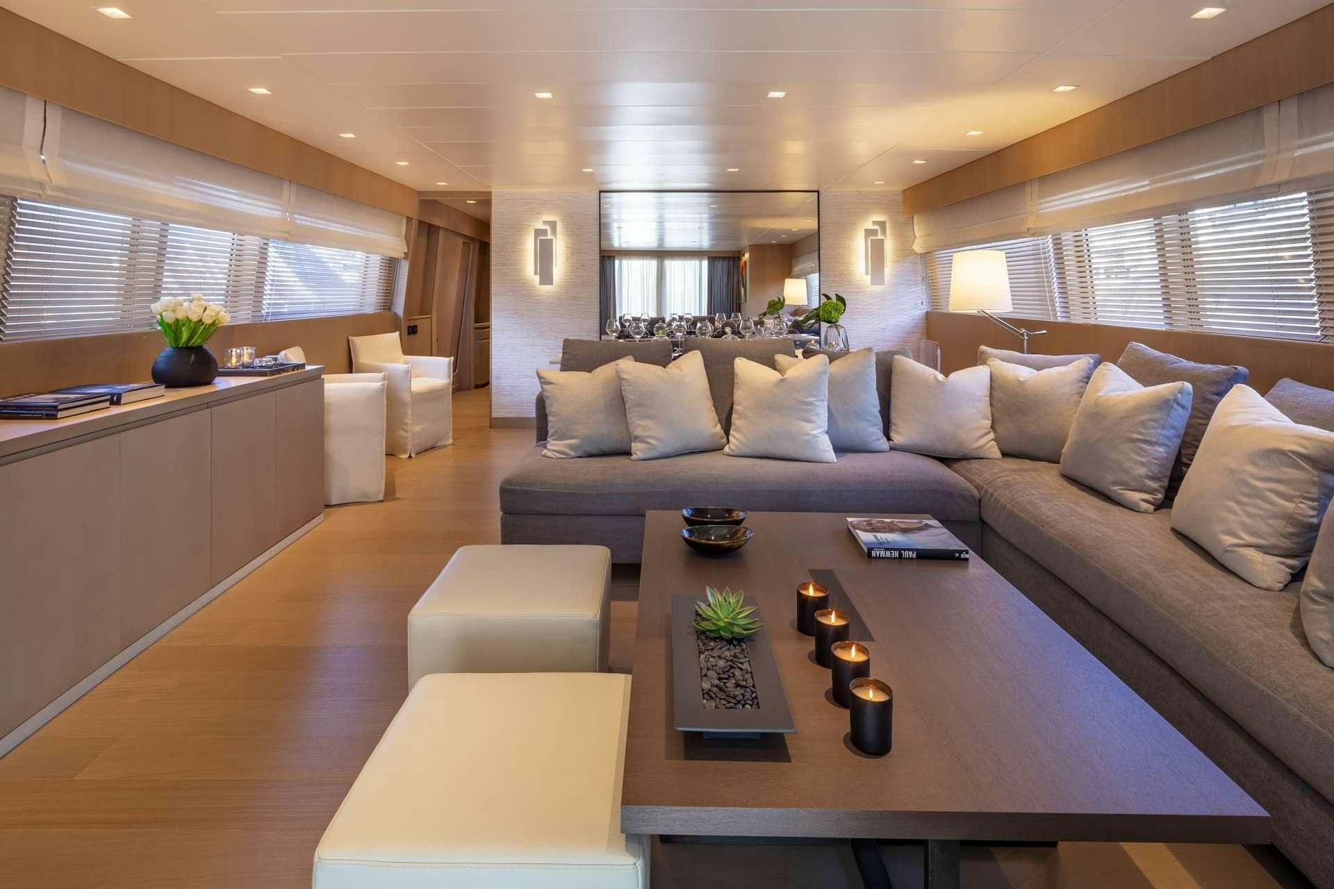 a living room with a couch and a coffee table aboard SUMMER FUN Yacht for Charter