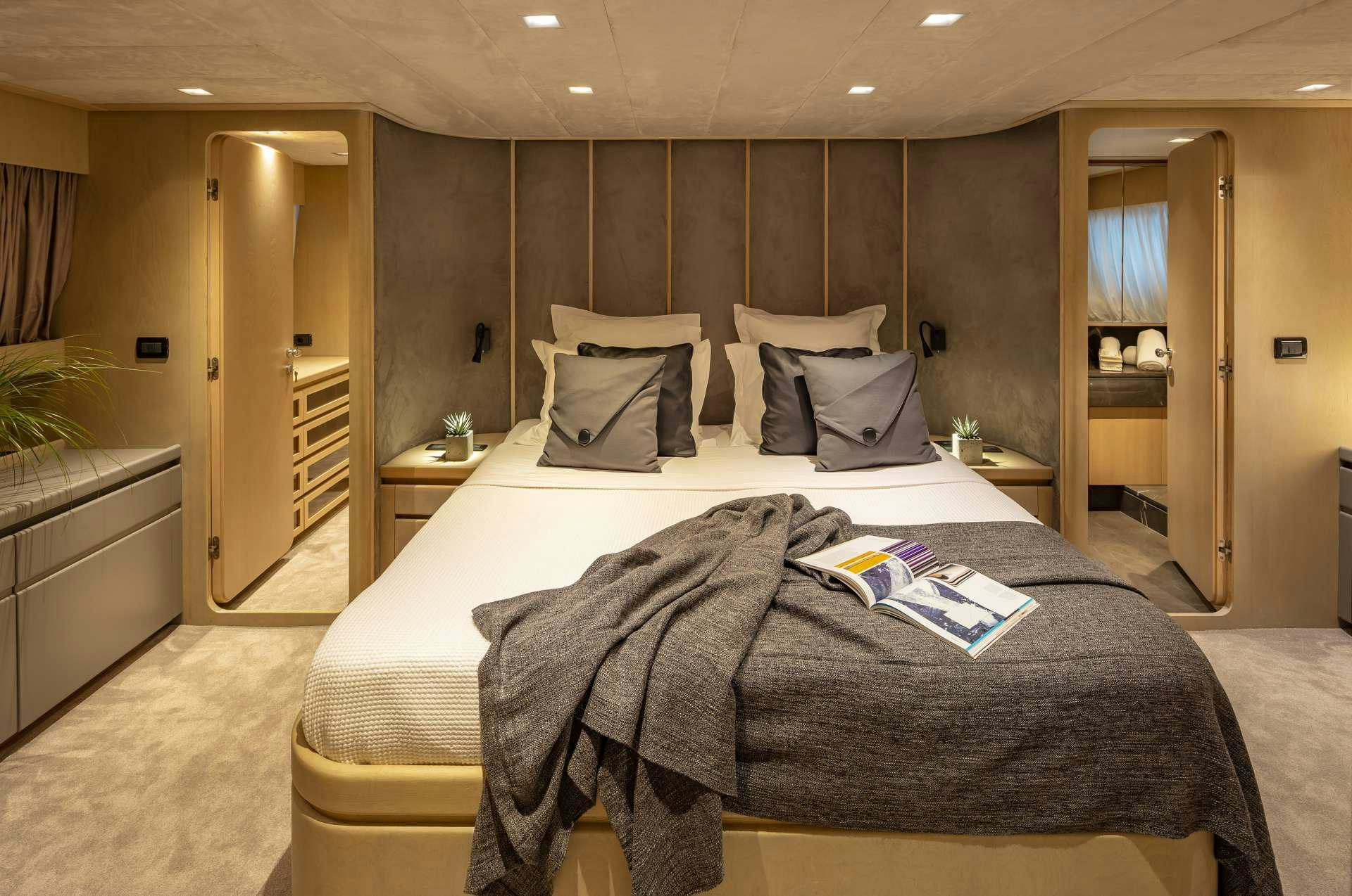 a hotel room with a bed aboard SUMMER FUN Yacht for Charter
