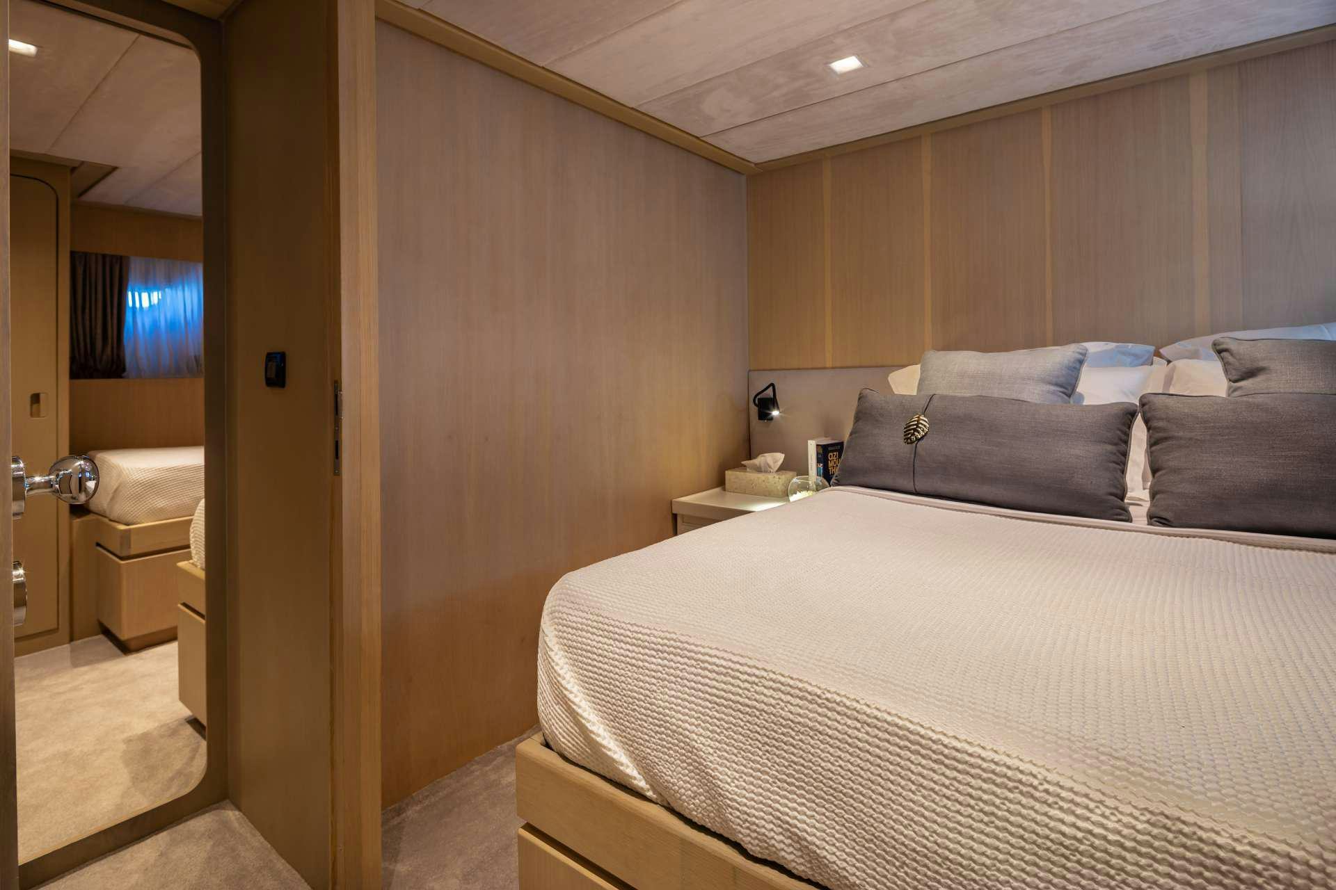 a bed in a room aboard SUMMER FUN Yacht for Charter