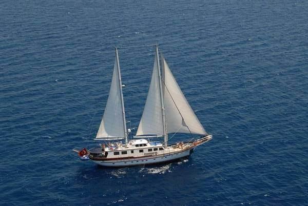 a sailboat on the water aboard RIGEL Yacht for Charter