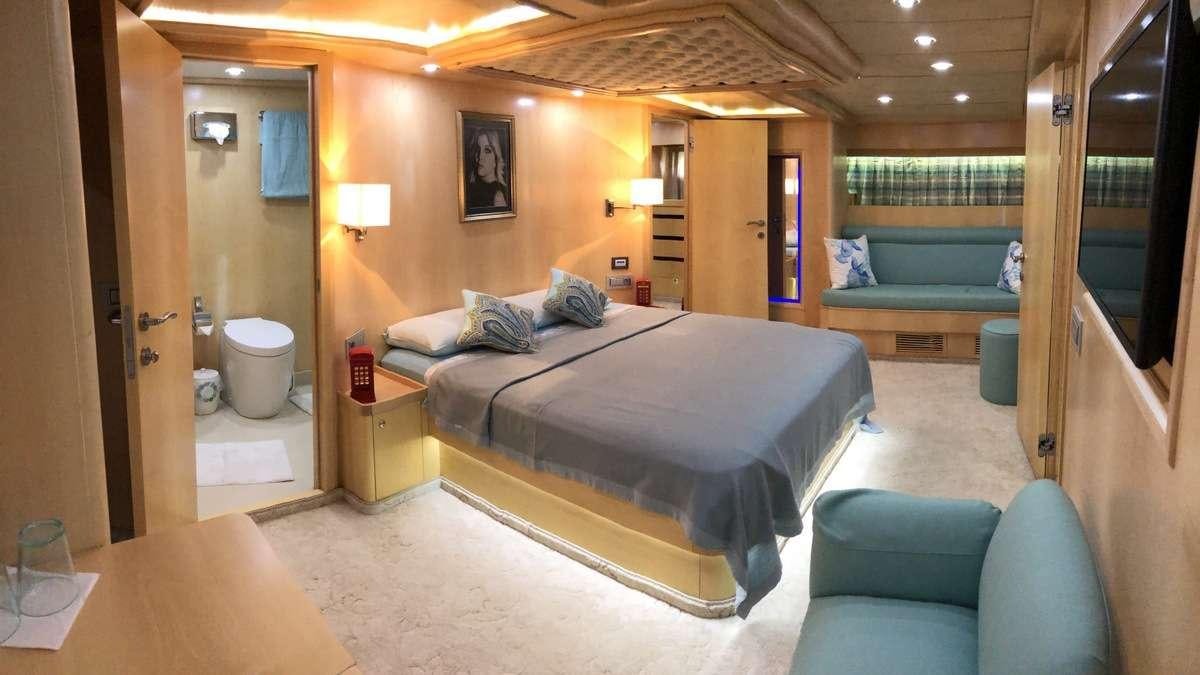 a bed in a room aboard RIGEL Yacht for Charter