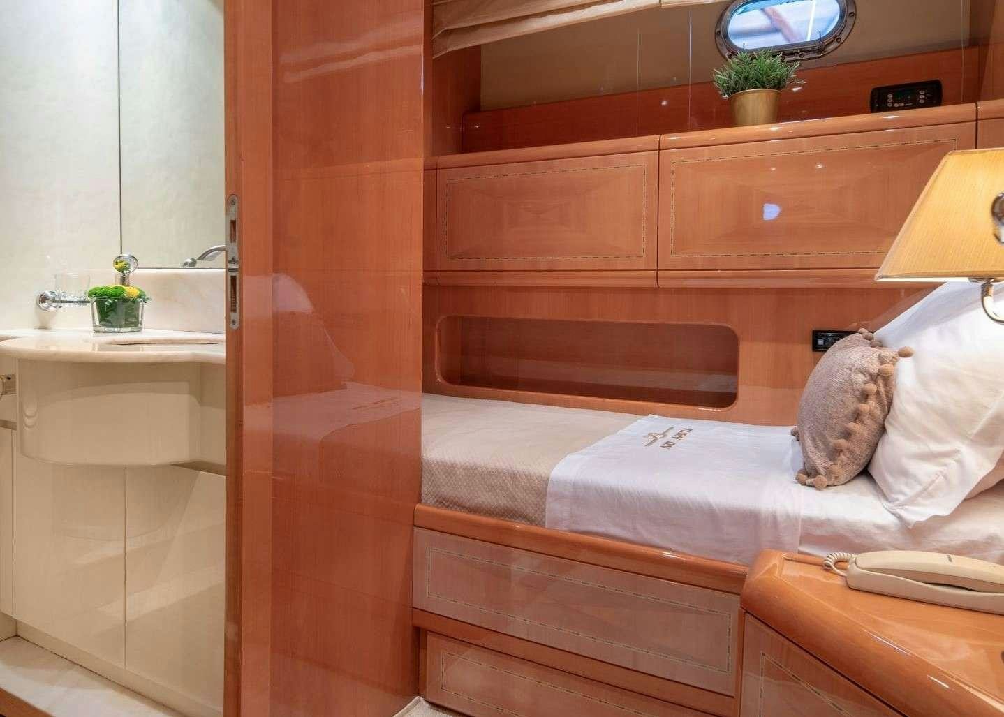 a bed in a room aboard TURN ON Yacht for Charter