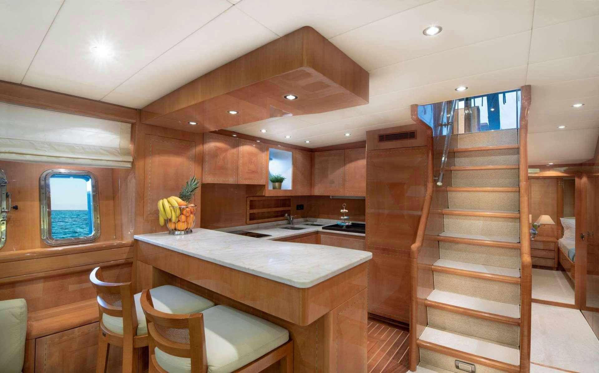 a wooden bunk bed in a room aboard TURN ON Yacht for Charter