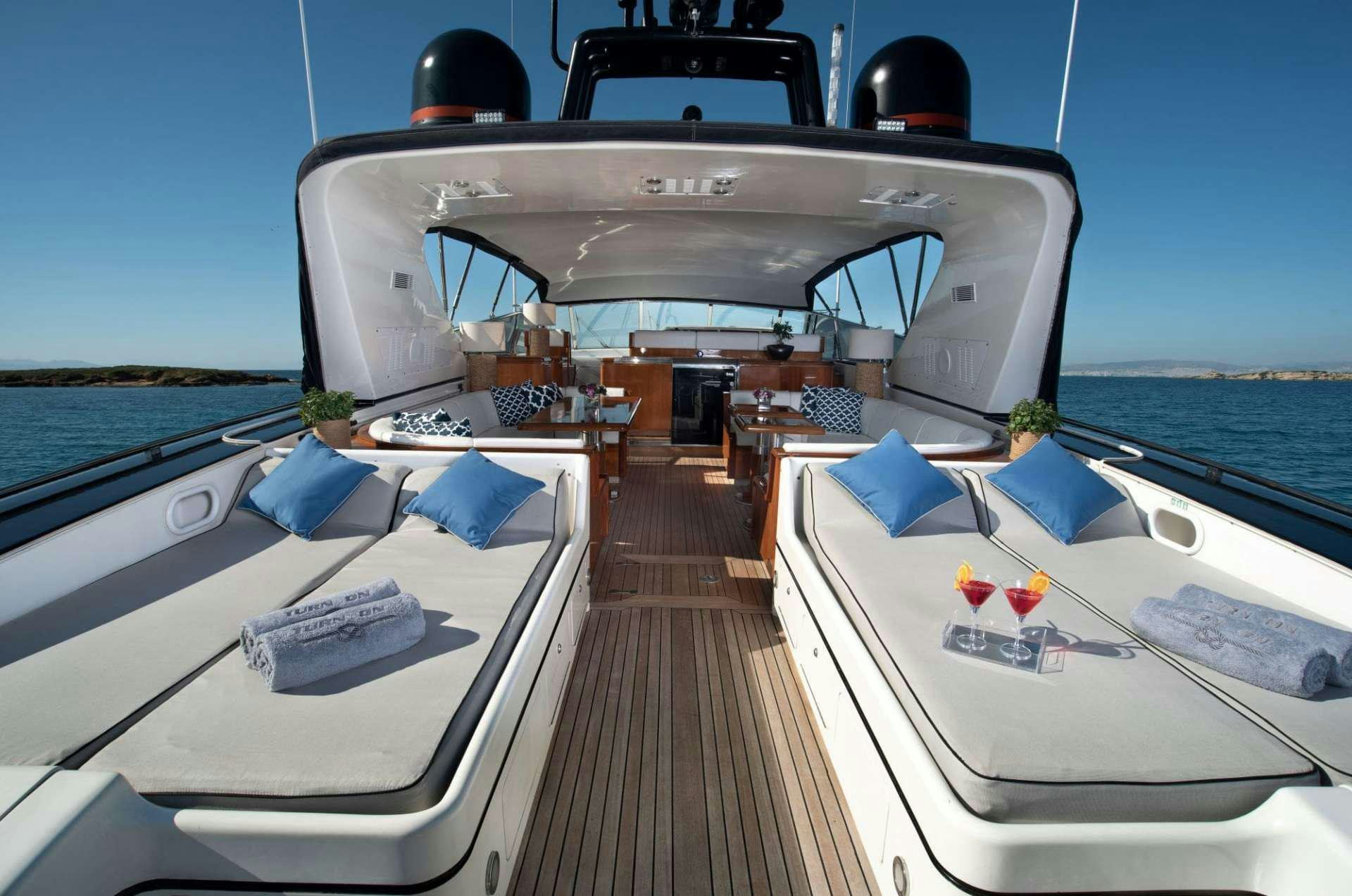 a boat on a deck aboard TURN ON Yacht for Charter