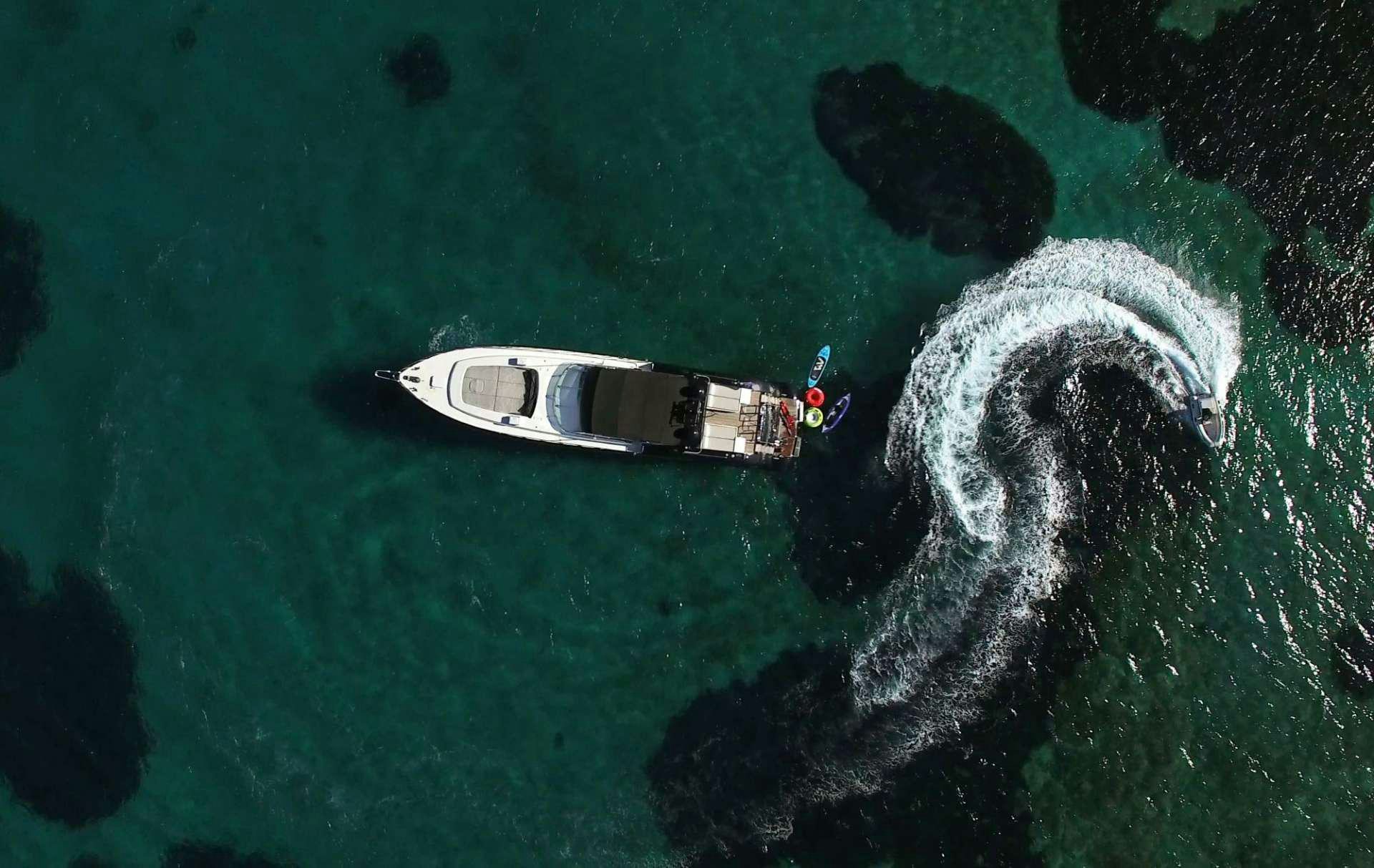 a boat in the water aboard TURN ON Yacht for Charter