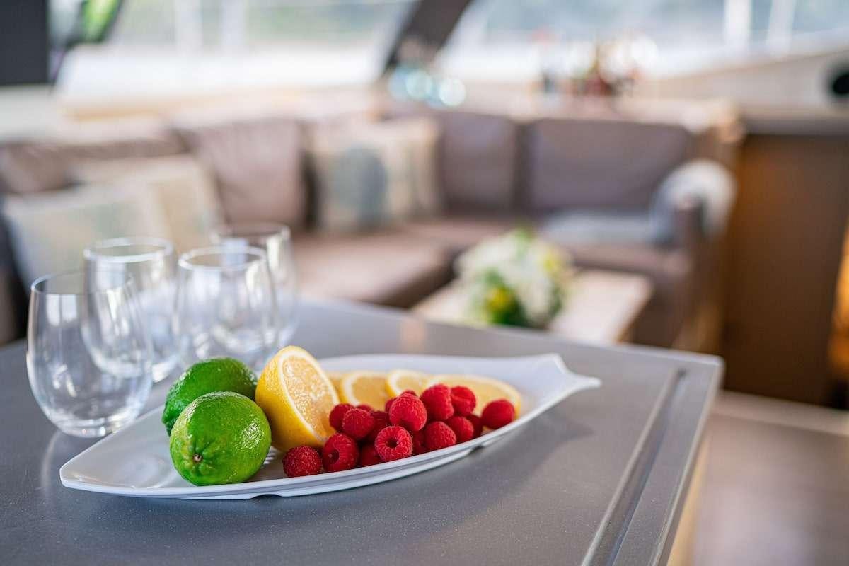 a plate of fruit aboard EDDIES IN TIME Yacht for Charter