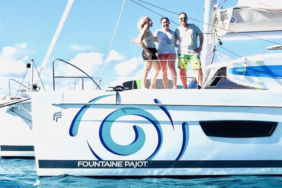 a group of people on a boat aboard EDDIES IN TIME Yacht for Charter