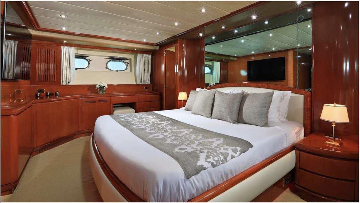 a bed in a room aboard DEMAREST Yacht for Charter