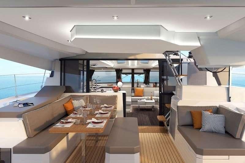 a modern looking living room aboard HERO'S JOURNEY Yacht for Charter