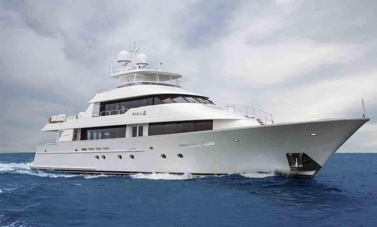 a large white yacht in the water aboard PLAN A Yacht for Charter