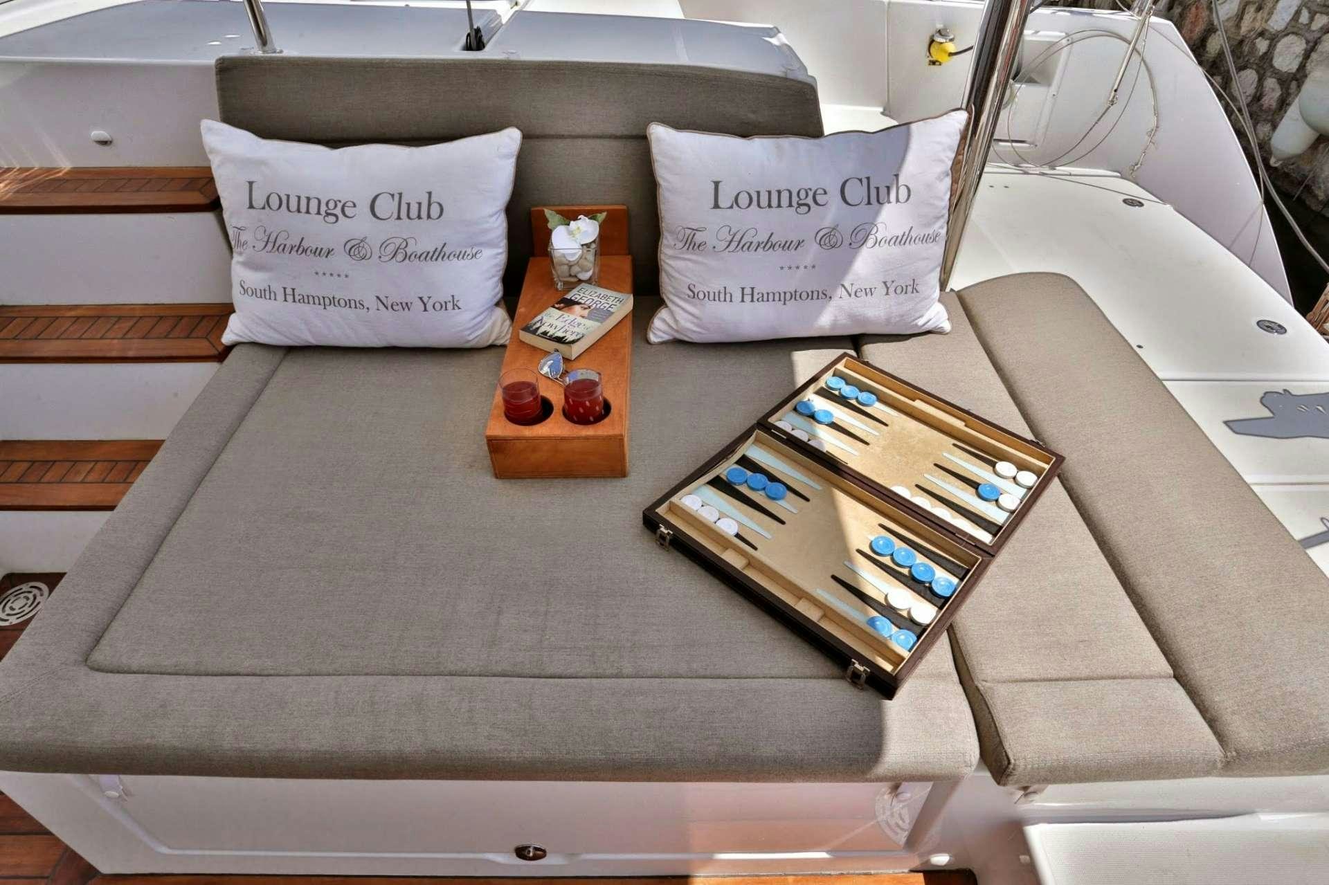 a table with a group of objects on it aboard NEW HORIZONS Yacht for Charter