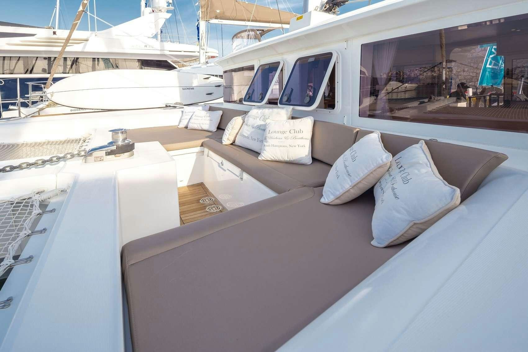 a boat with pillows on it aboard NEW HORIZONS Yacht for Charter