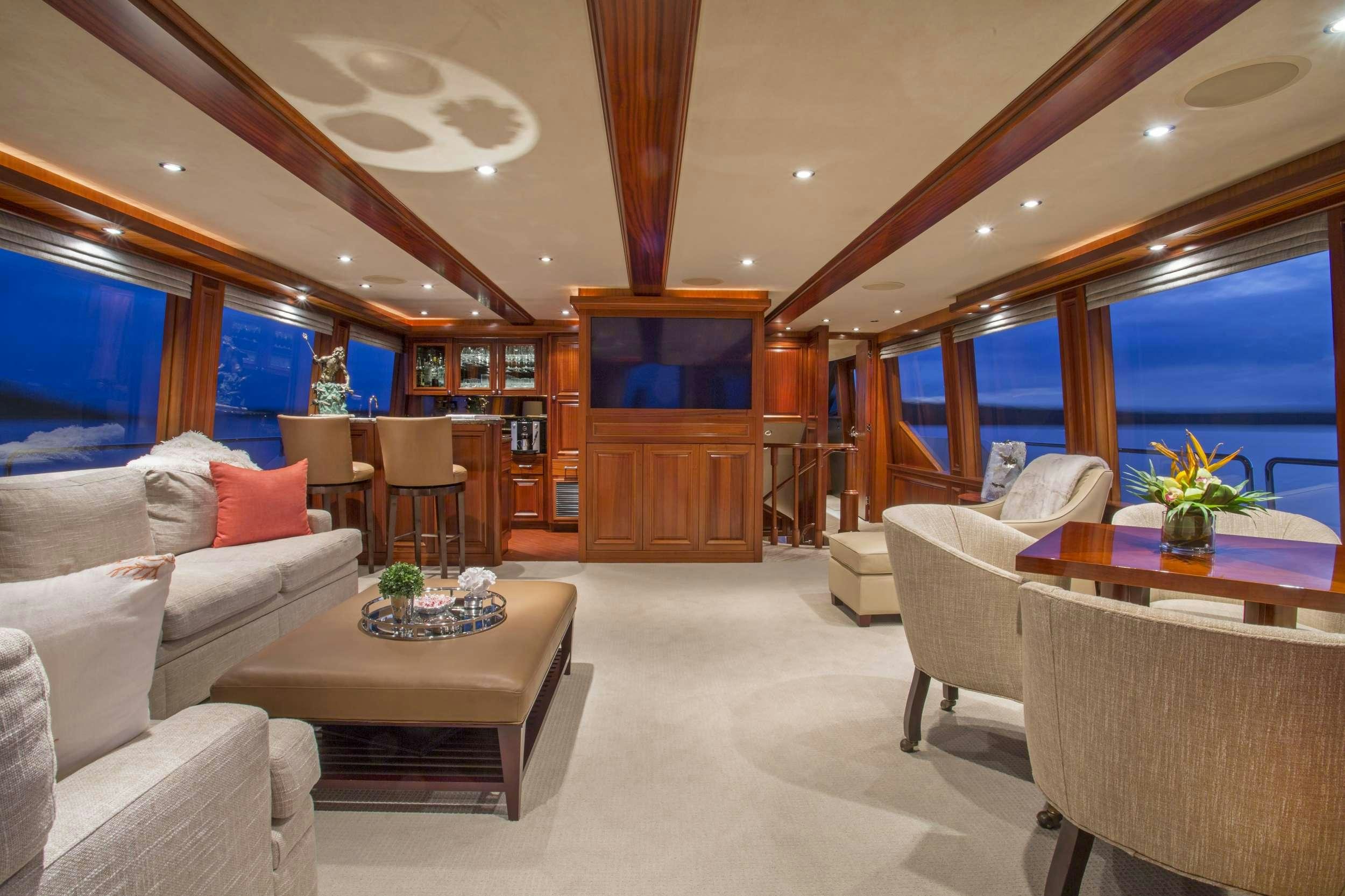 a living room with a large window aboard ANTARES Yacht for Charter