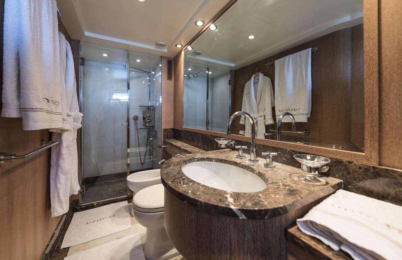 The yacht's bathroom features luxurious marble countertops and modern fixtures. aboard KALIMERA Yacht for Charter