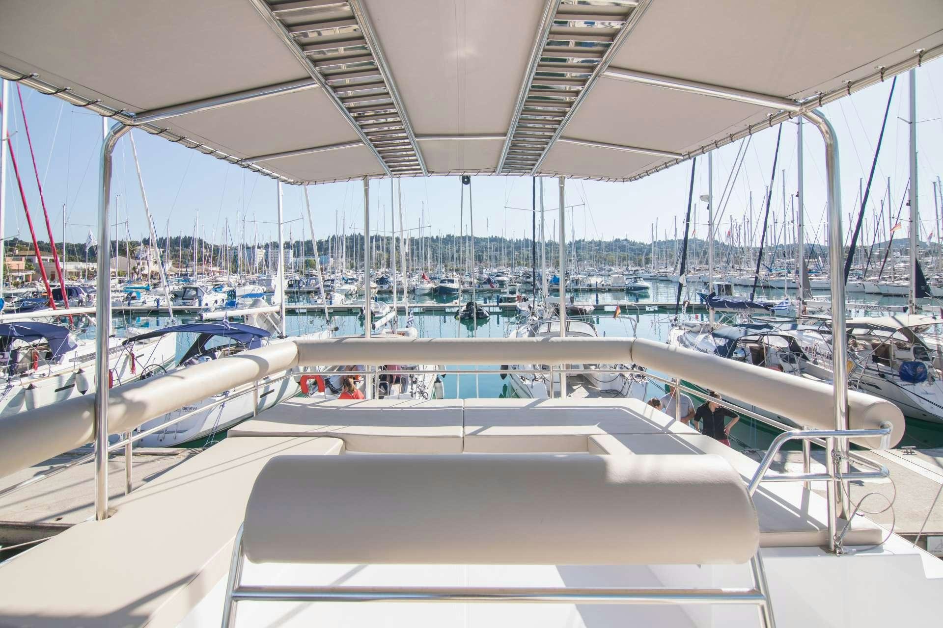 a boat is parked in a harbor aboard Sithonia Yacht for Charter