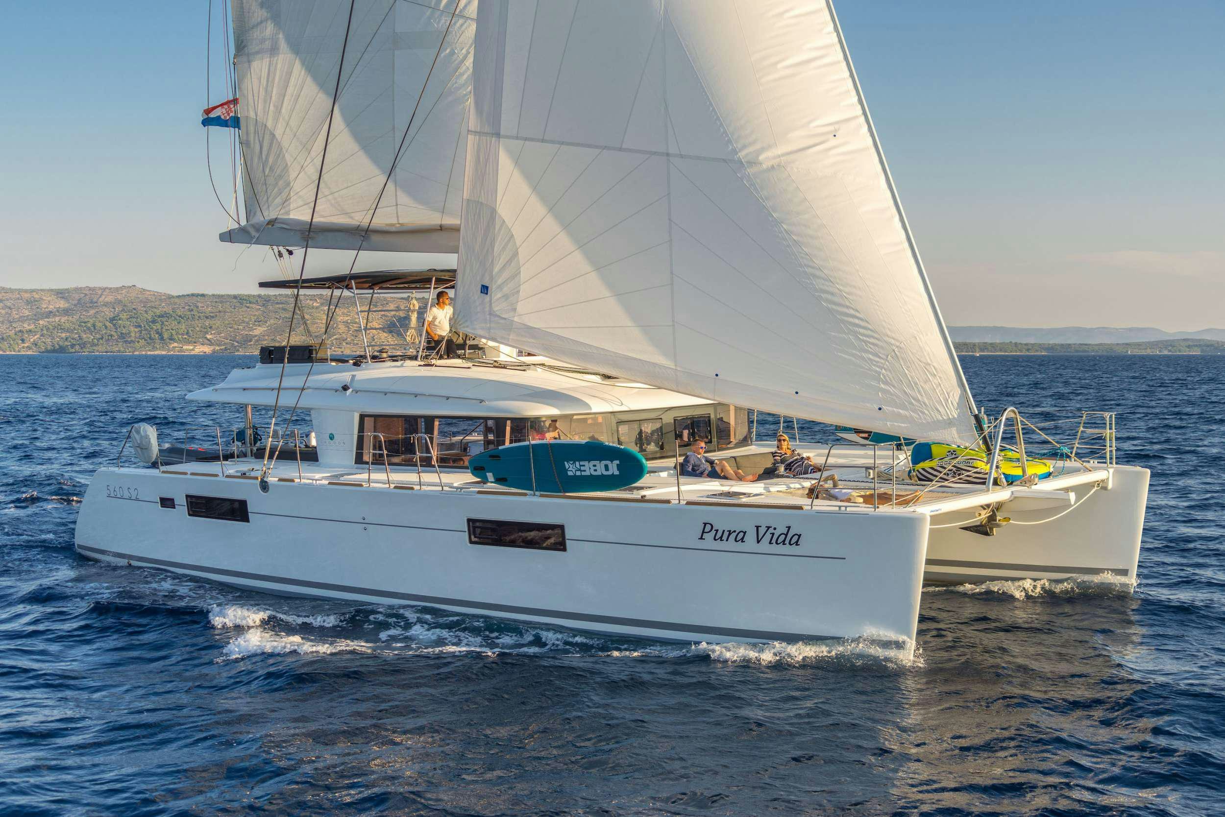 a sailboat on the water aboard Pura Vida Yacht for Charter