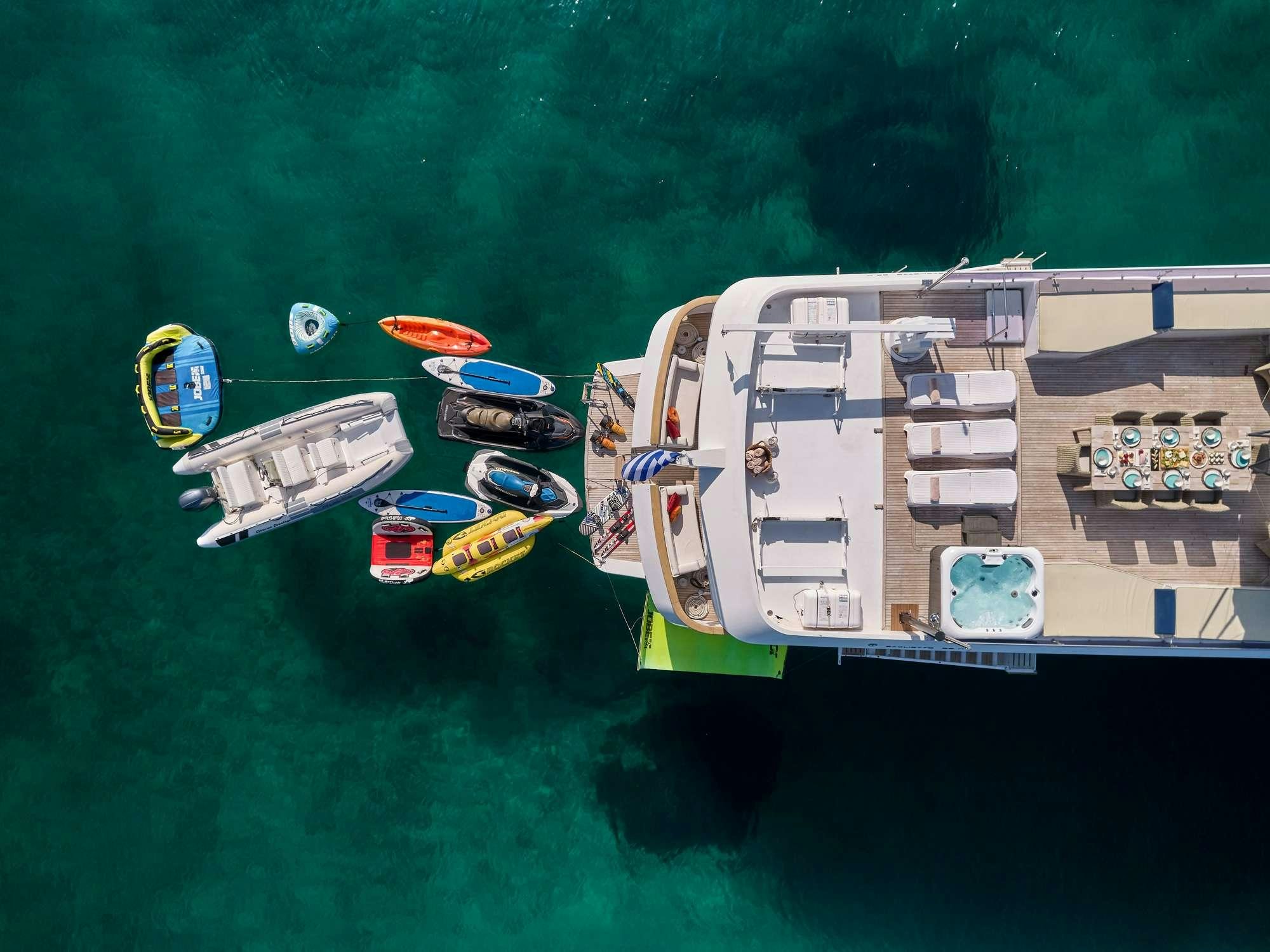 a group of boats on the water aboard LADY RINA Yacht for Charter