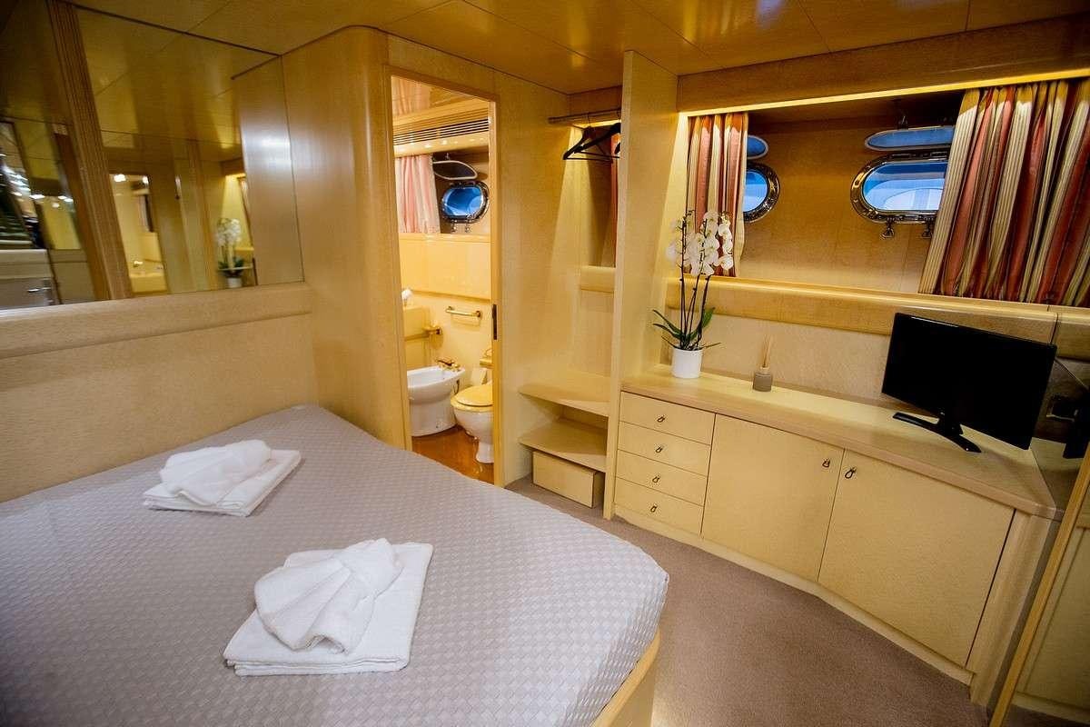 a bathroom with a large bed aboard LADY RINA Yacht for Charter