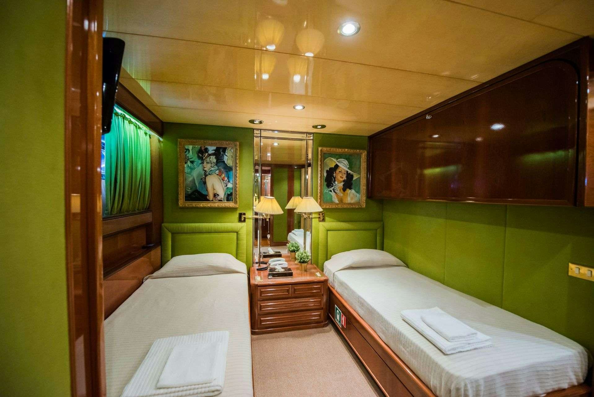 a room with two beds aboard LADY RINA Yacht for Charter