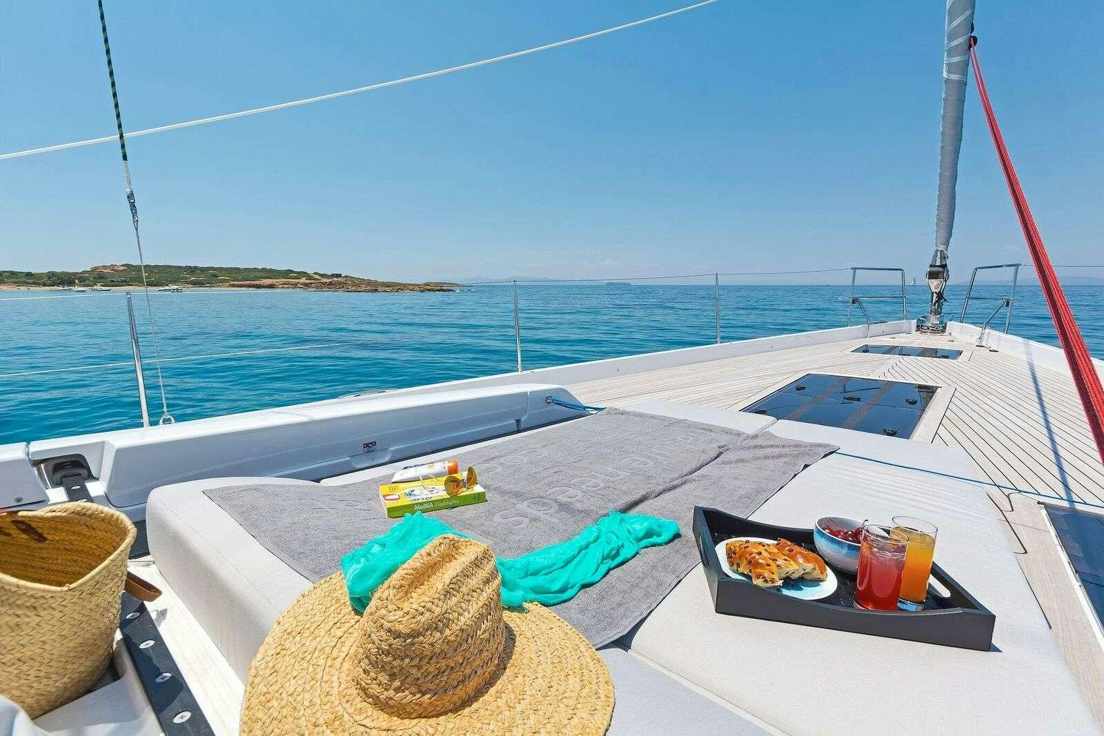 a boat on the water aboard ALIZEE Yacht for Charter
