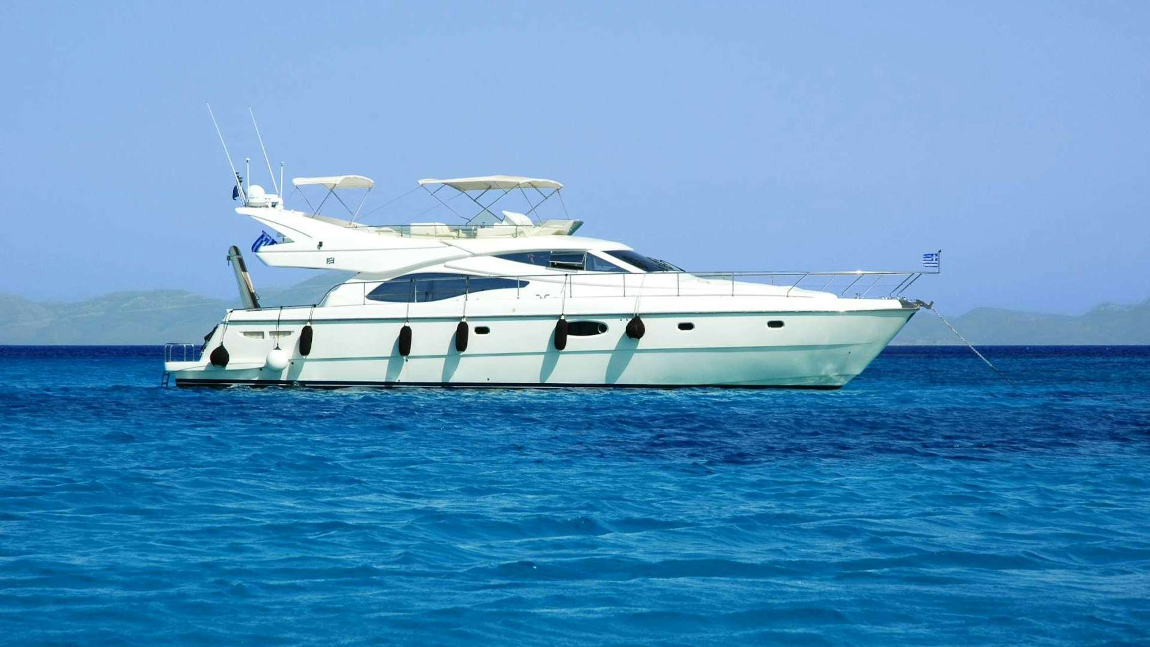 a white boat in the water aboard ESPERANCE III Yacht for Charter