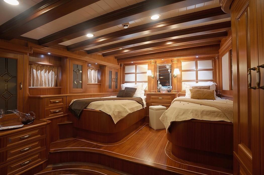 a room with two beds aboard KAPTAN KADIR Yacht for Charter