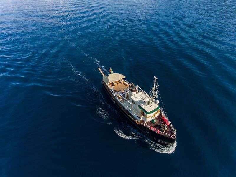 a boat in the water aboard DP MONITOR Yacht for Charter