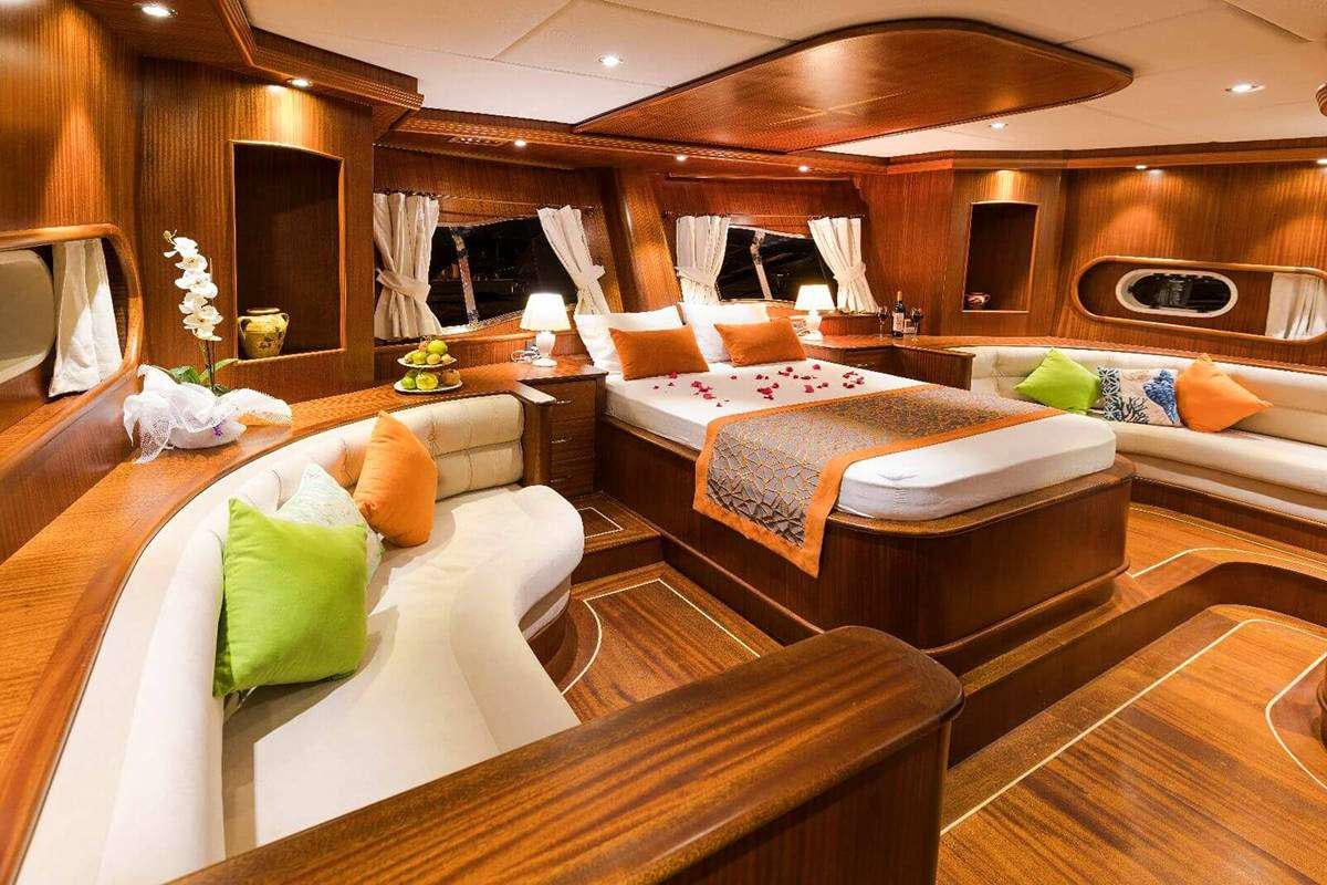 a large bathroom with a large bed aboard VISTA MARE Yacht for Charter